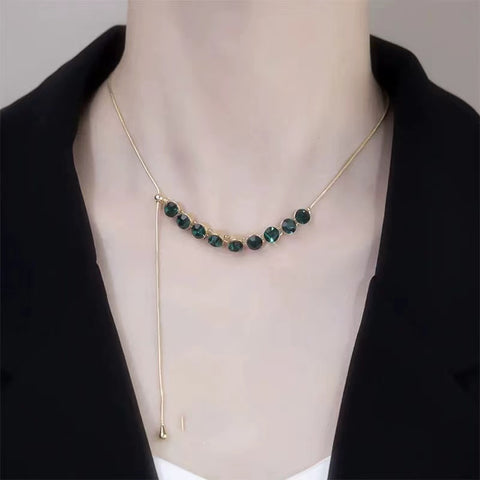 Emerald and gold plated clavicle necklace