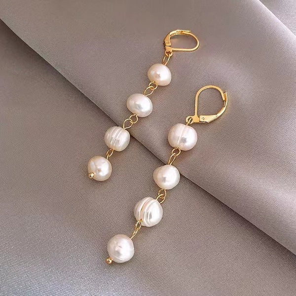 Four Pearl Earrings